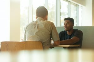 Two people having a mortgage meeting